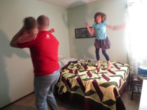 Playing "spin me" and jumping on the bed:)